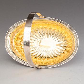 OSKAR LINDROOS, A parcel gilt bread basket, marked OL, Helsinki 1926.