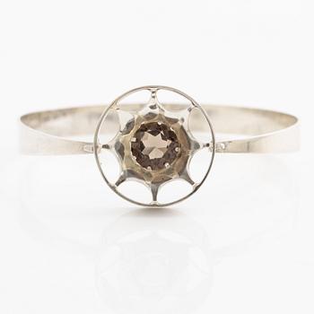 Arm ring and brooch, silver with smoky quartz, Kultasepät Salovaara.