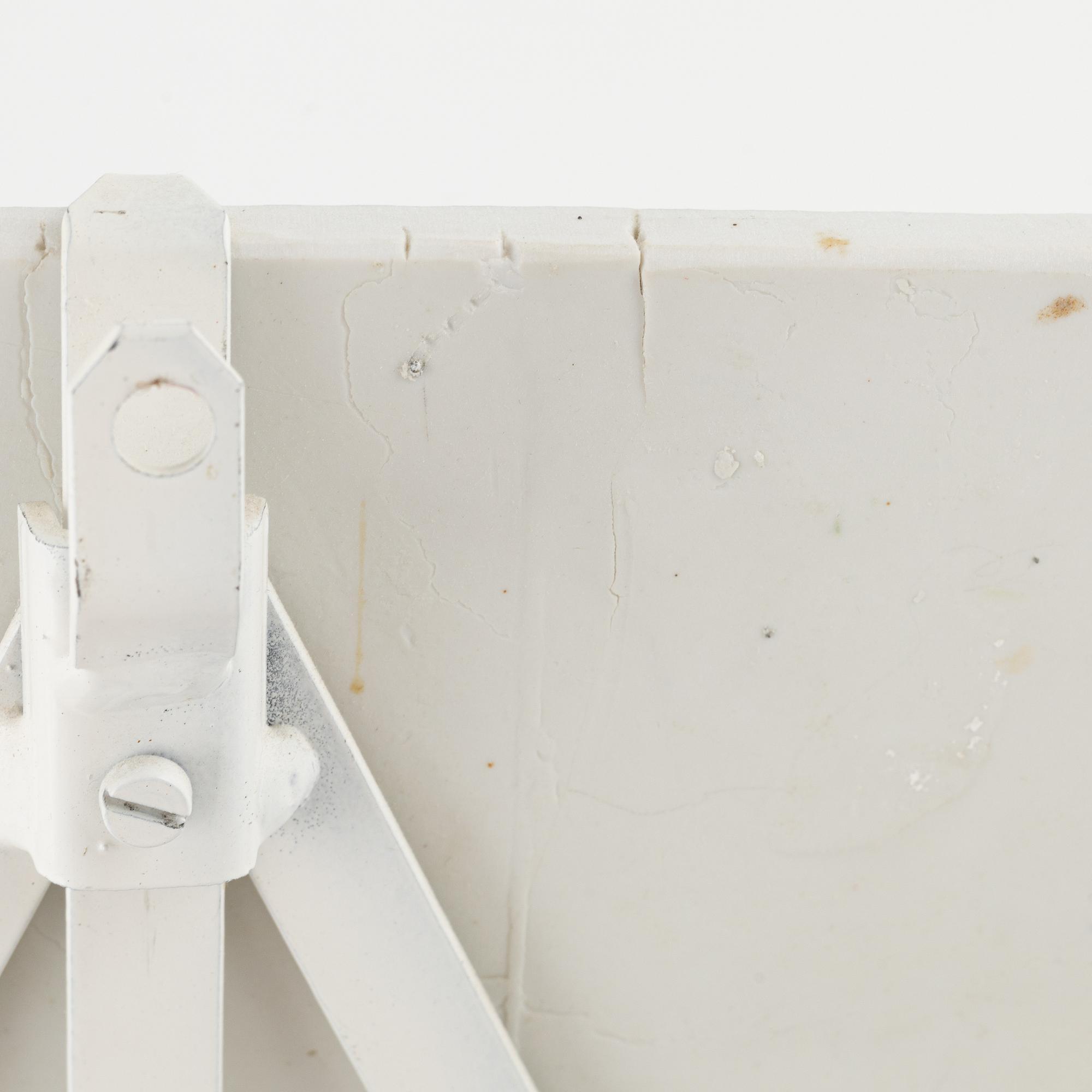 A pair of earthenware bas reliefs by Bertil Lundgren for Rörstrand, Sweden.