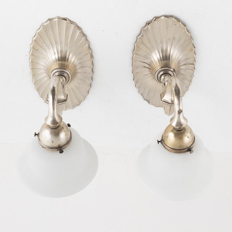 A pair of silver-plate wall lamps, C.G. Hallberg, 1920's.