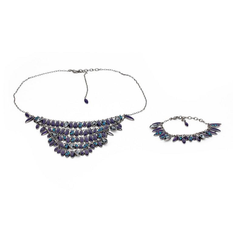 SWAROVSKI, a silver colored necklace and bracelet with swarovski crystals.