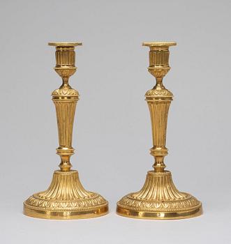 A pair of candlesticks, Louis XVI-style, circa 1900.