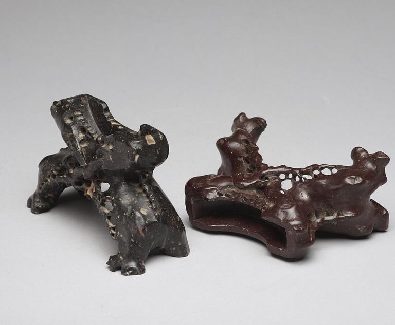 Two Chinese soapstone placques and stands, early 20th Century.