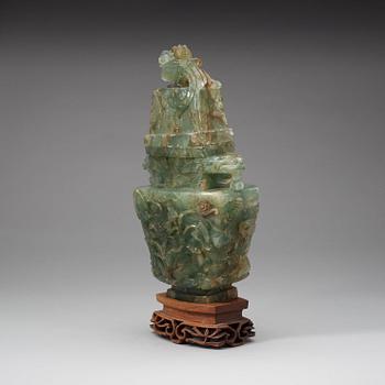 A Chinese carved fluorite vase with cover, 20th Century.