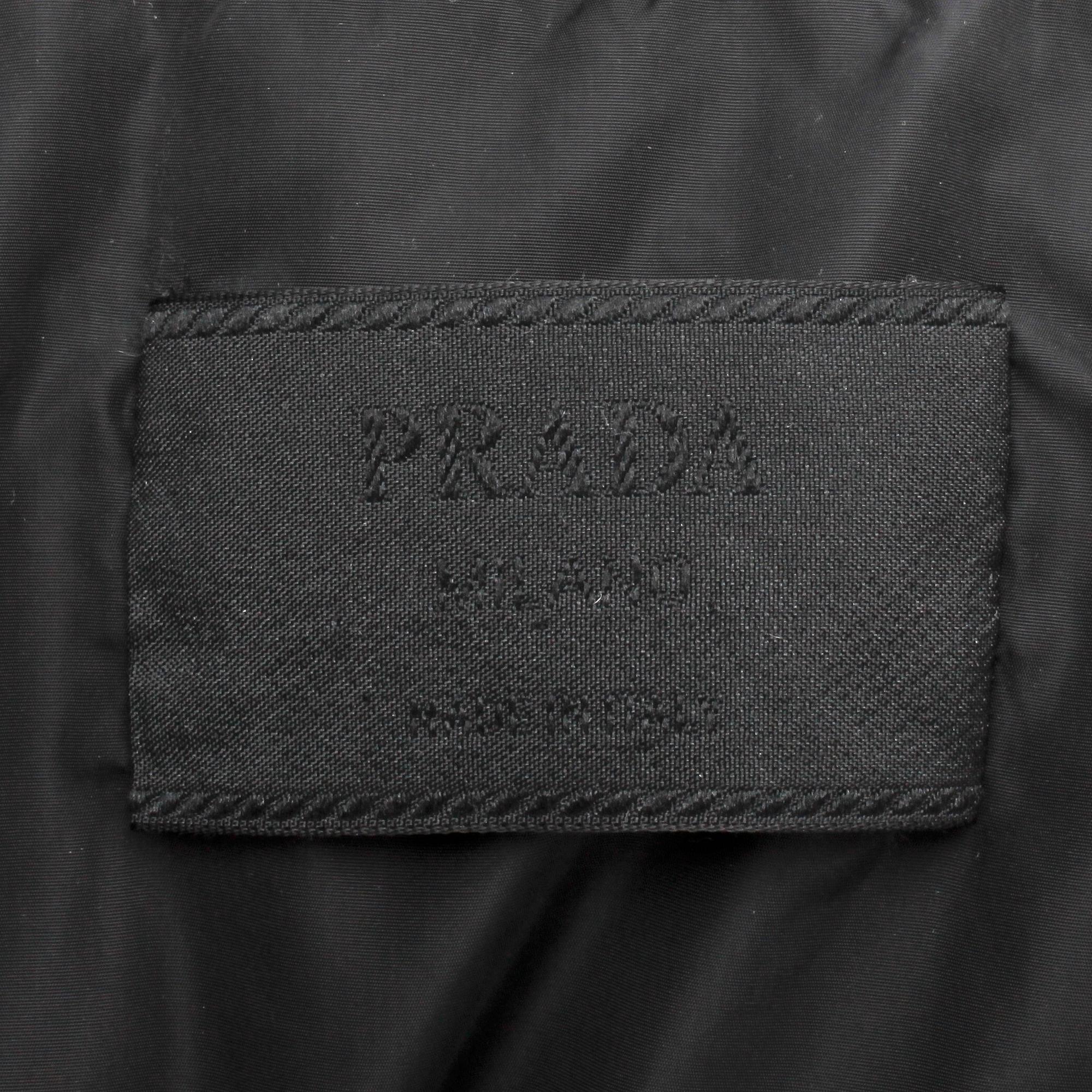 PRADA, a black down jacket, size 48.