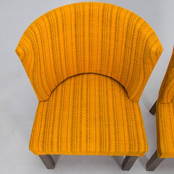 A Finnish 1930s dining table and eight chairs.