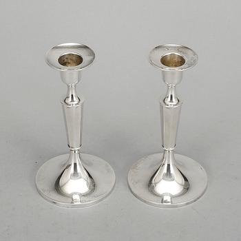 LJUSSTAKAR, ett par, silver, MGAB. Uppsala, 1962.