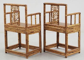 A pair of Bambu and Hardwood armchairs. Qing dynasty, 19th Century.