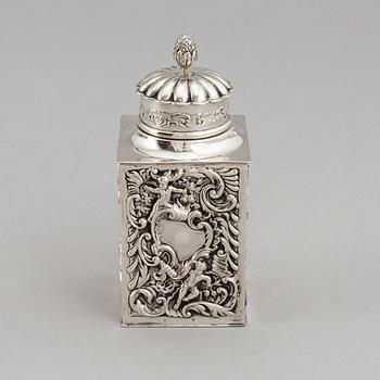 A silver tea caddy, mark of William Comyns & Sons,  London 1898.