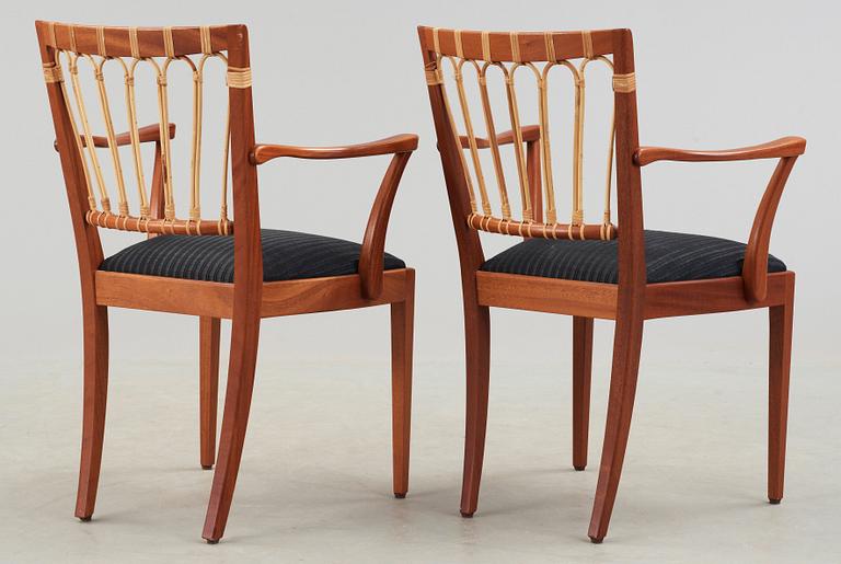 A pair of Josef Frank mahogany armchairs, Svenskt Tenn.
