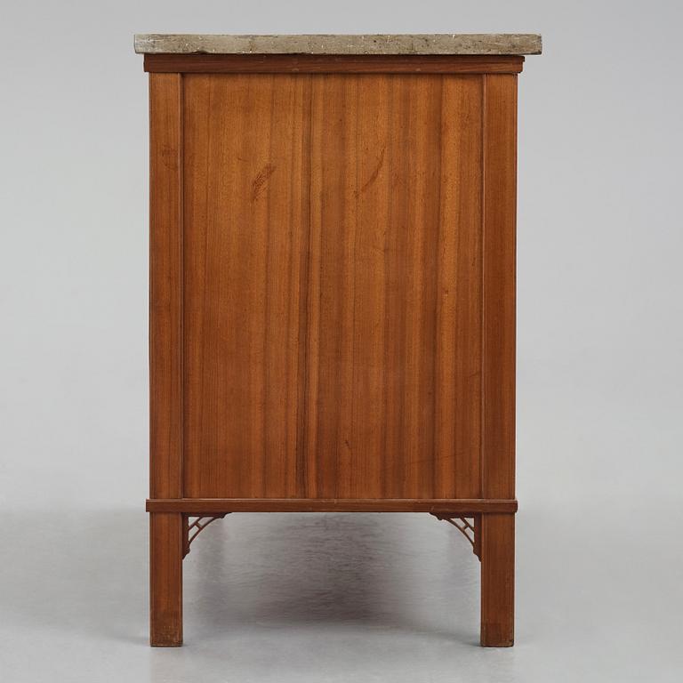 A mahogany-veneered late Gustavian commode by G. Iversson (master in Stockholm 1778-1813).