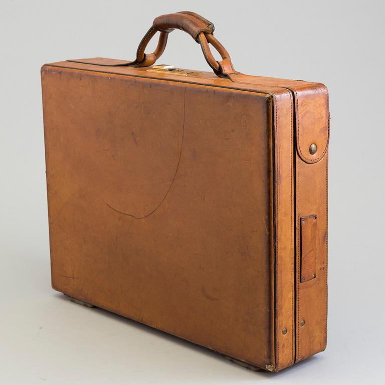 A leather brifcase, Hartman.