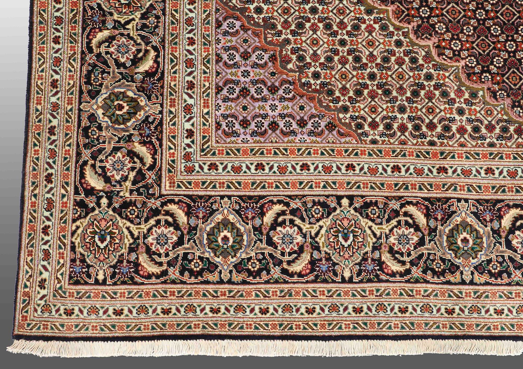 A CARPET, Tabriz part silk , so called 40 Radj, ca 298 x 202 cm.