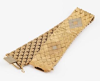 ARMBAND, 18K tvåfärgat guld, utländska stämplar. Vikt 52,9 gram.