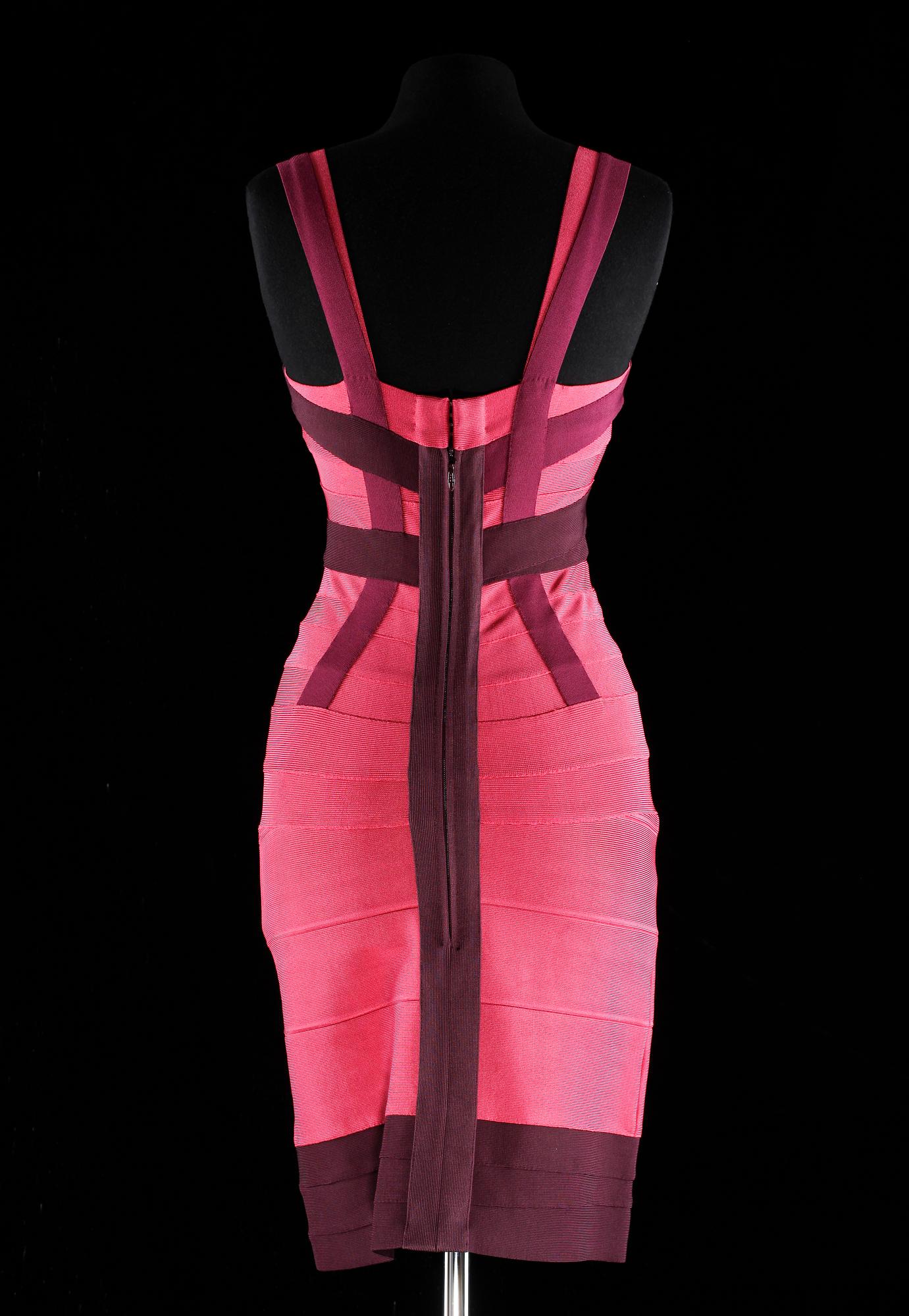 A pink and purple tight, strech dress by Herve Leger.