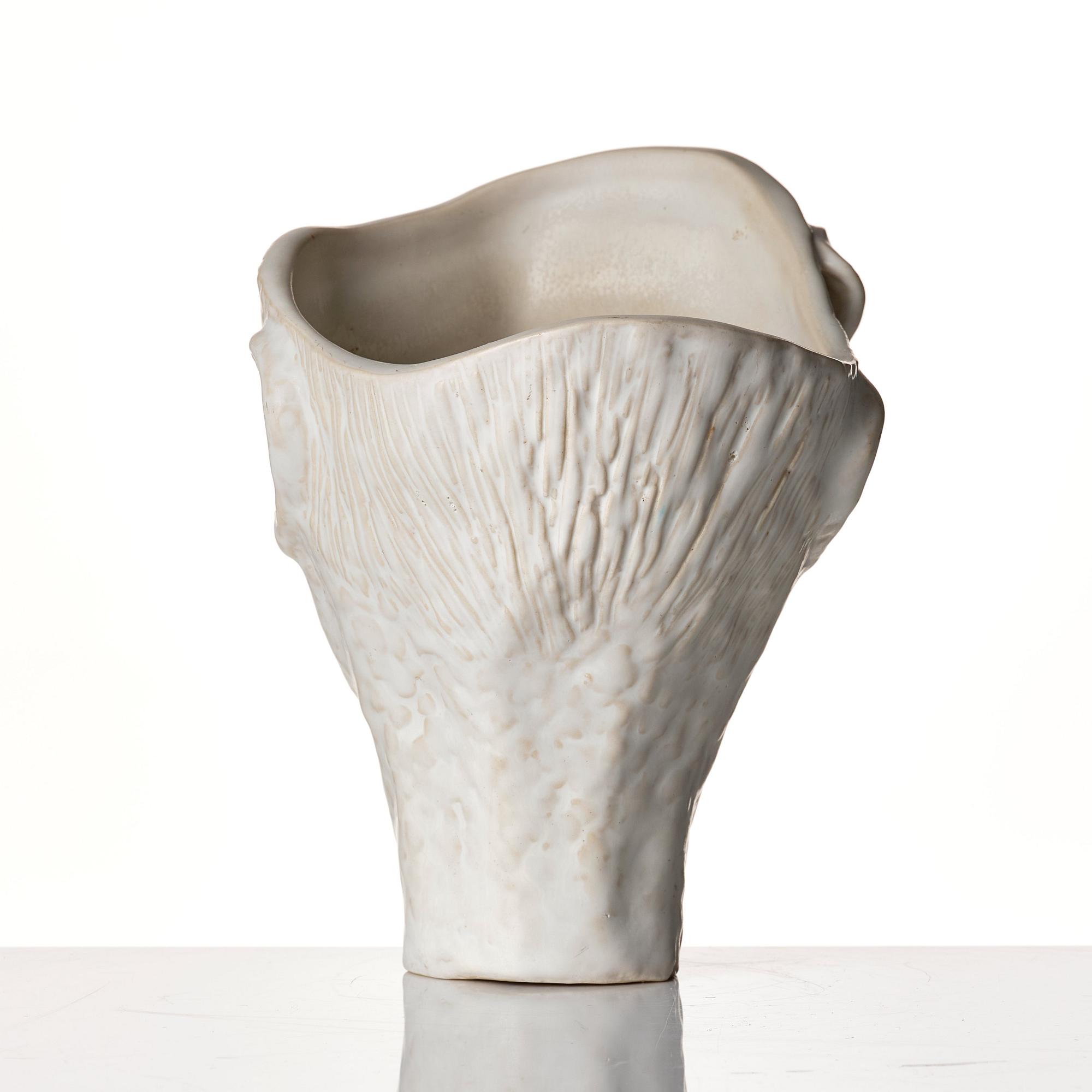 Stig Lindberg, a white glazed stoneware vase of a head, Gustavsberg Studio, probably 1940s.