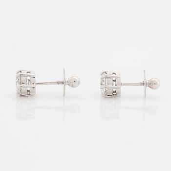 A pair of platinum earrings set with round brilliant-cut diamonds total weight 2.00 cts D if (internally flawless).