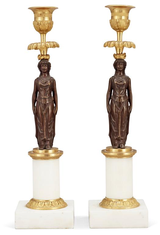 A pair of late Gustavian circa 1800 candlesticks attributed to F. L. Rung.