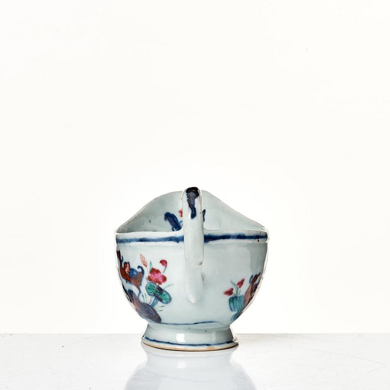 A famille rose "tobacco leaf" sauce boat, Qing dynasty, Qianlong (1736-95).