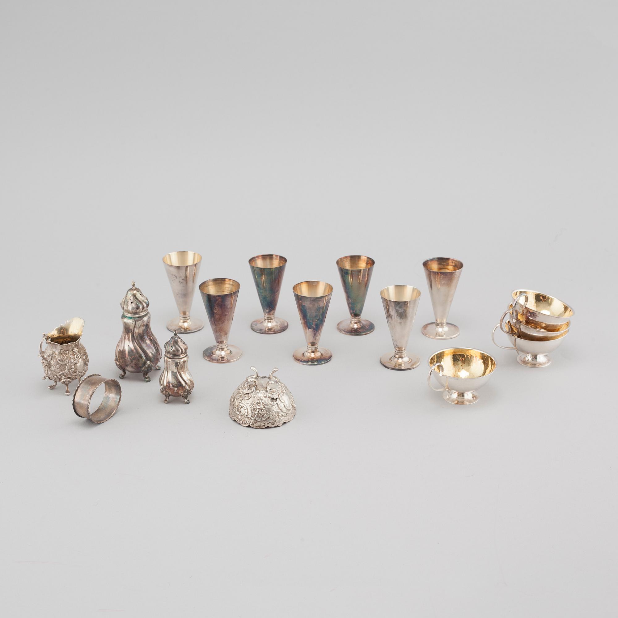 16 pieces of silverware, mostly Sweden, around the mid 20th century.