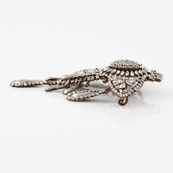 Demi parure, a pair of earrings, and a brooch, with so-called steel diamonds, 19th century.