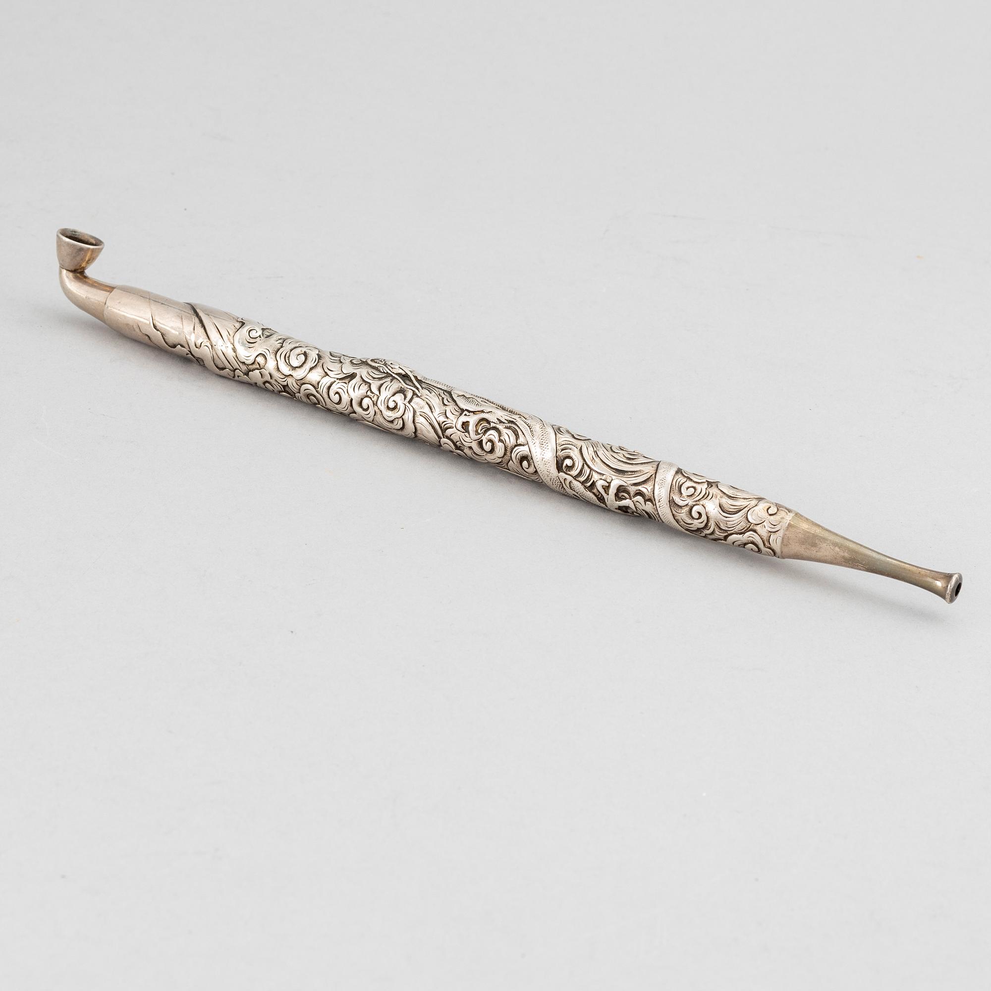 A Japanese silver opium pipe, Meiji period (1868-1912).