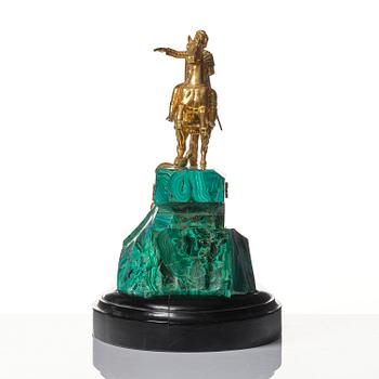 A malachite and gilt bronze sculpture of Peter the Great on horseback after Falconet, 19th century.