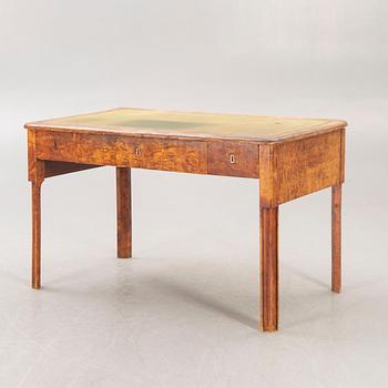 A mid 1800s birch Empire writing desk.