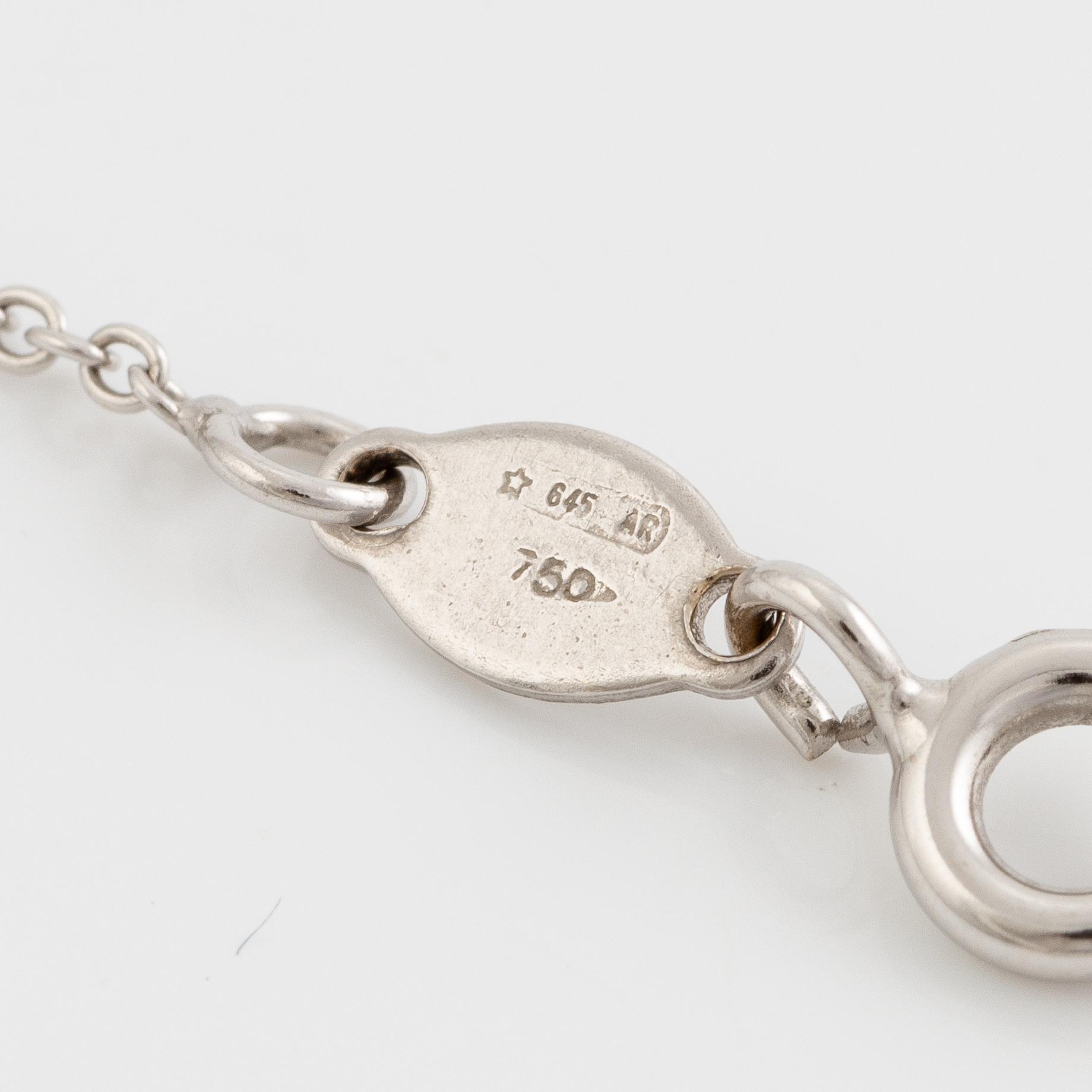 Pendant, 18K white gold with ruby and small diamonds, with chain 18K white gold.