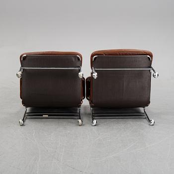 A pair of 'Karin' easy chairs by Bruno Mathsson for Dux, designed 1969.