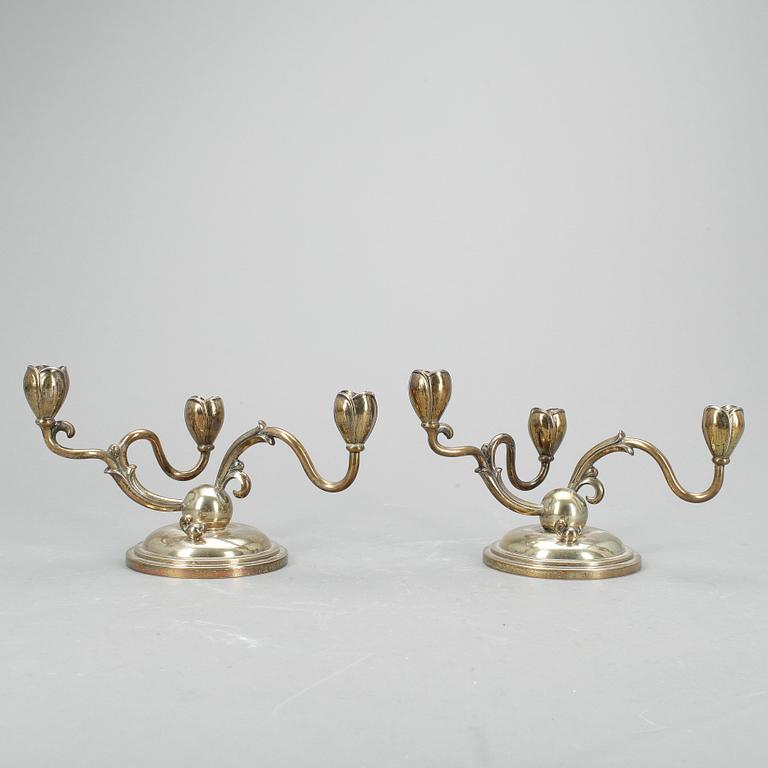 LJUSSTAKAR, ett par, W A Bolin, silver, 1950.
