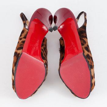 CHRISTIAN LOUBOUTIN, a pair of leopard printed peep-toe sandals. Size 38.