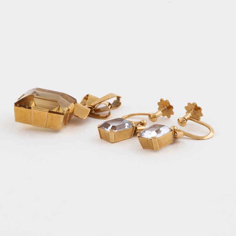 A citrine pendant and a pair of synthetic spinell earrings.