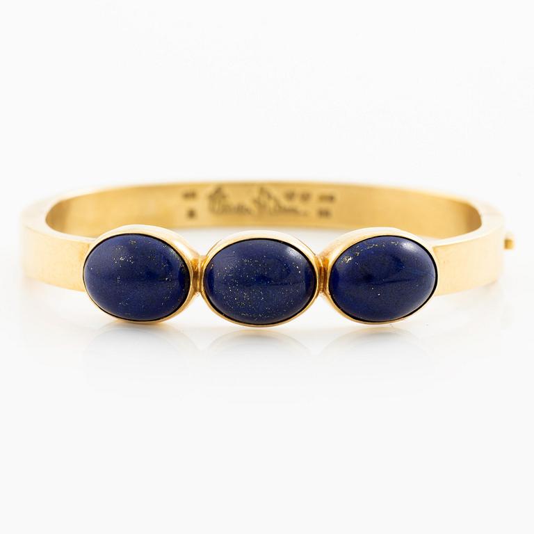 Wiwen Nilsson, a bracelet, 18K gold with lapis lazuli, Lund 1965.