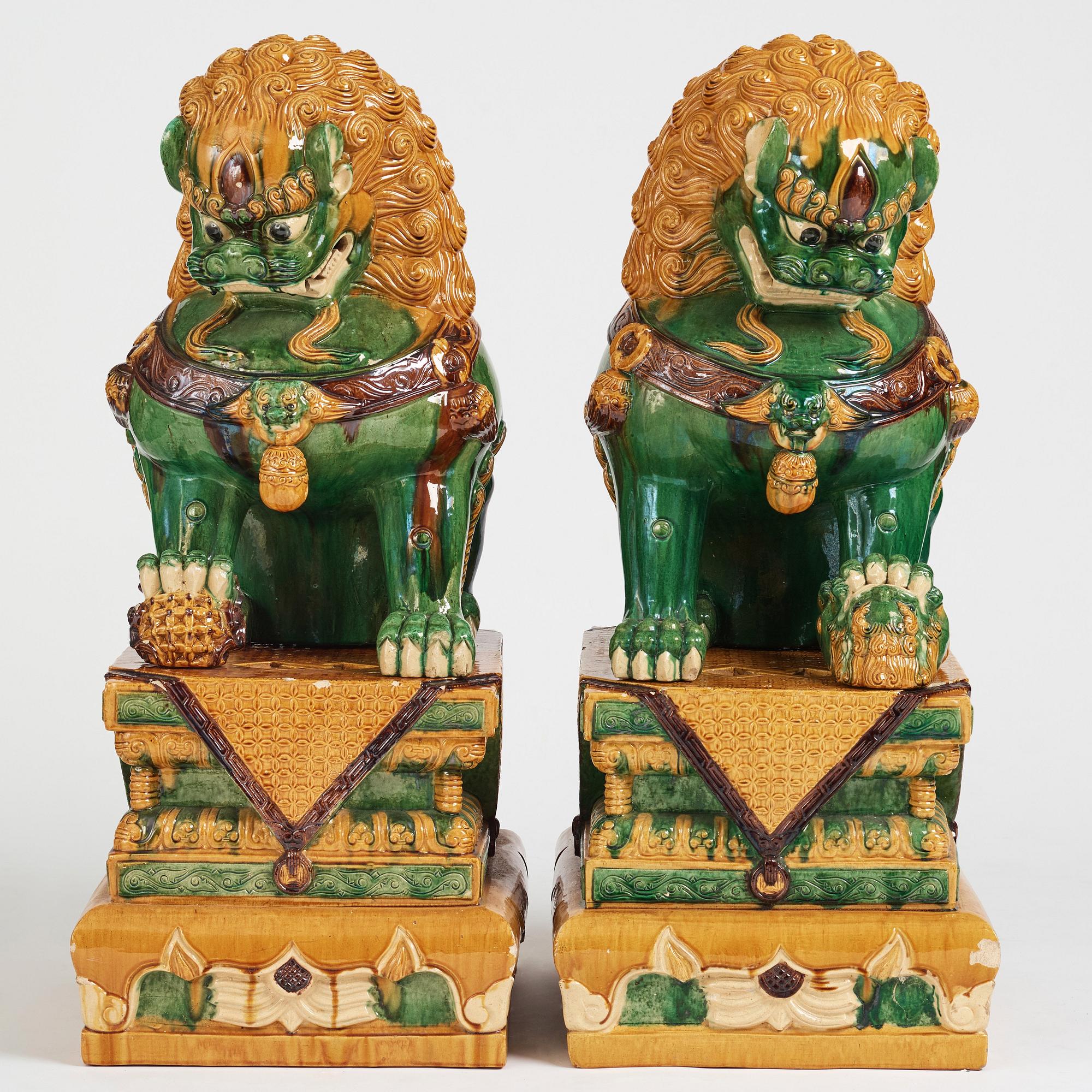 A pair of large buddhist lions, early 20th Century.