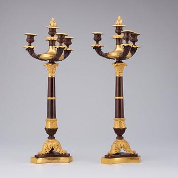 A pair of  Empire early 19th century four-light candelabra.