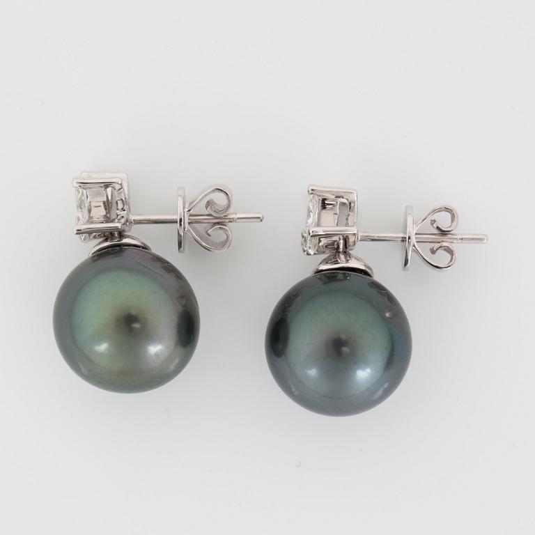 A pair of Tahiti pearl, Ø 12 mm, and diamond earrings.