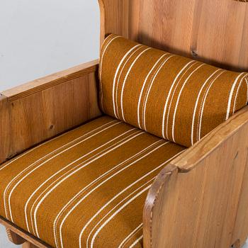 Axel Einar Hjorth, a "Lovö" stained pine armchair, Nordiska Kompaniet, Sweden, 1930's.