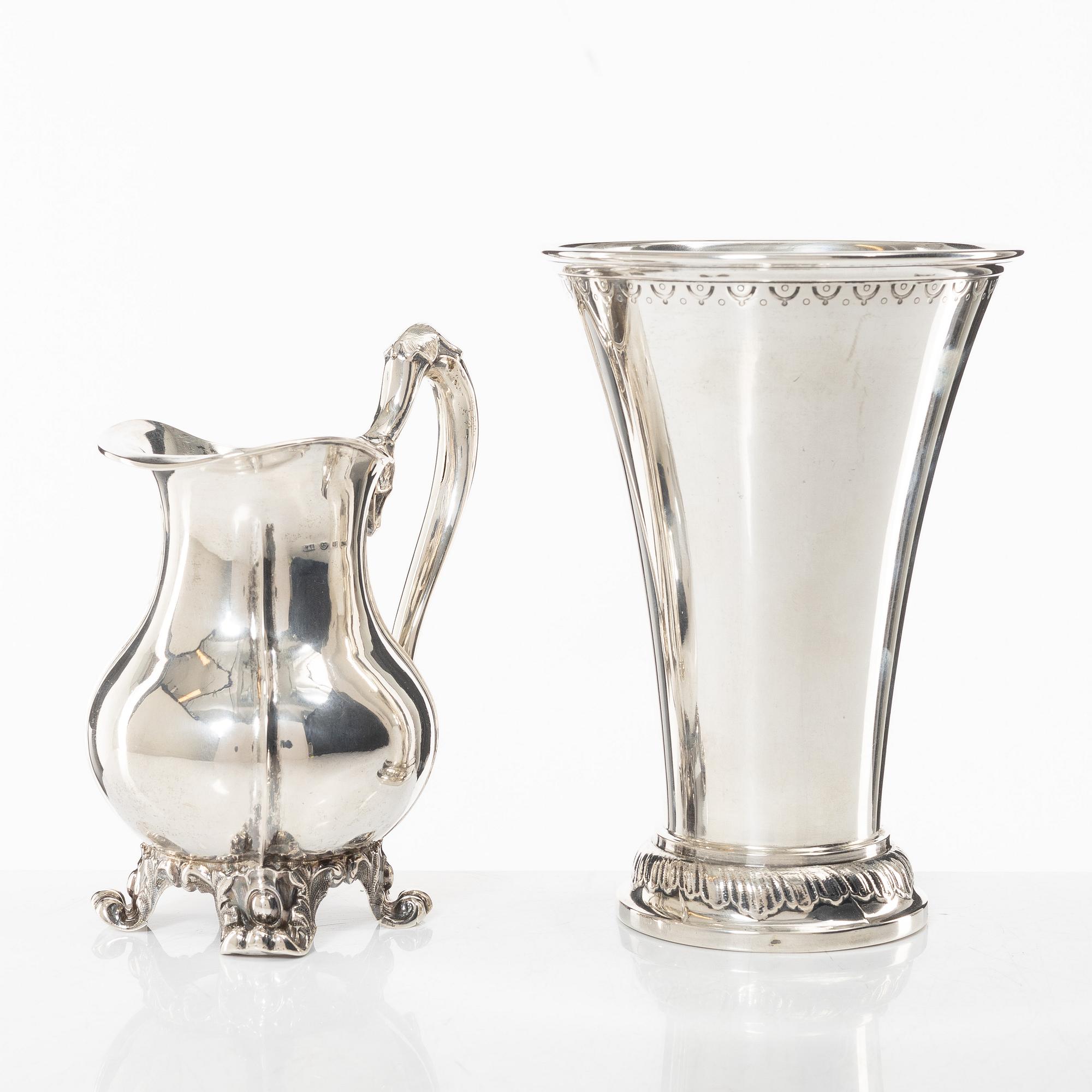 A Swedish silver beaker and a jug, including CG Hallberg, Stockholm 1927.