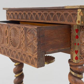 A Baroque style table with boardgames. 1900-tal.