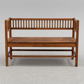 a wooden sofa from around 1900.