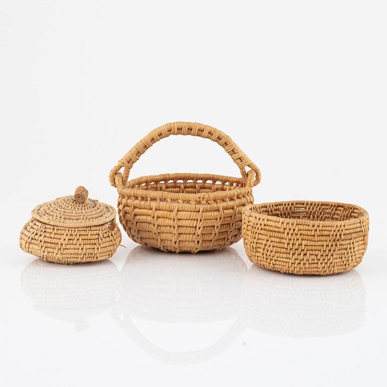 Three small root baskets, two signed.