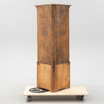 A Boroque corner cabinet, first half of the 18th Century.