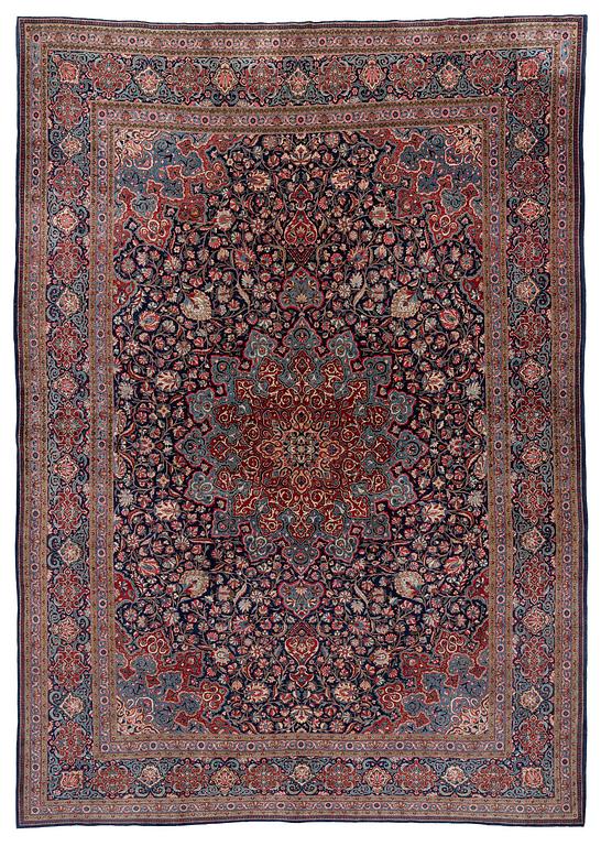 A semi-antique Kashan 'Dabir' carpet, central Persia (Iran), c. 437 x 299 cm.