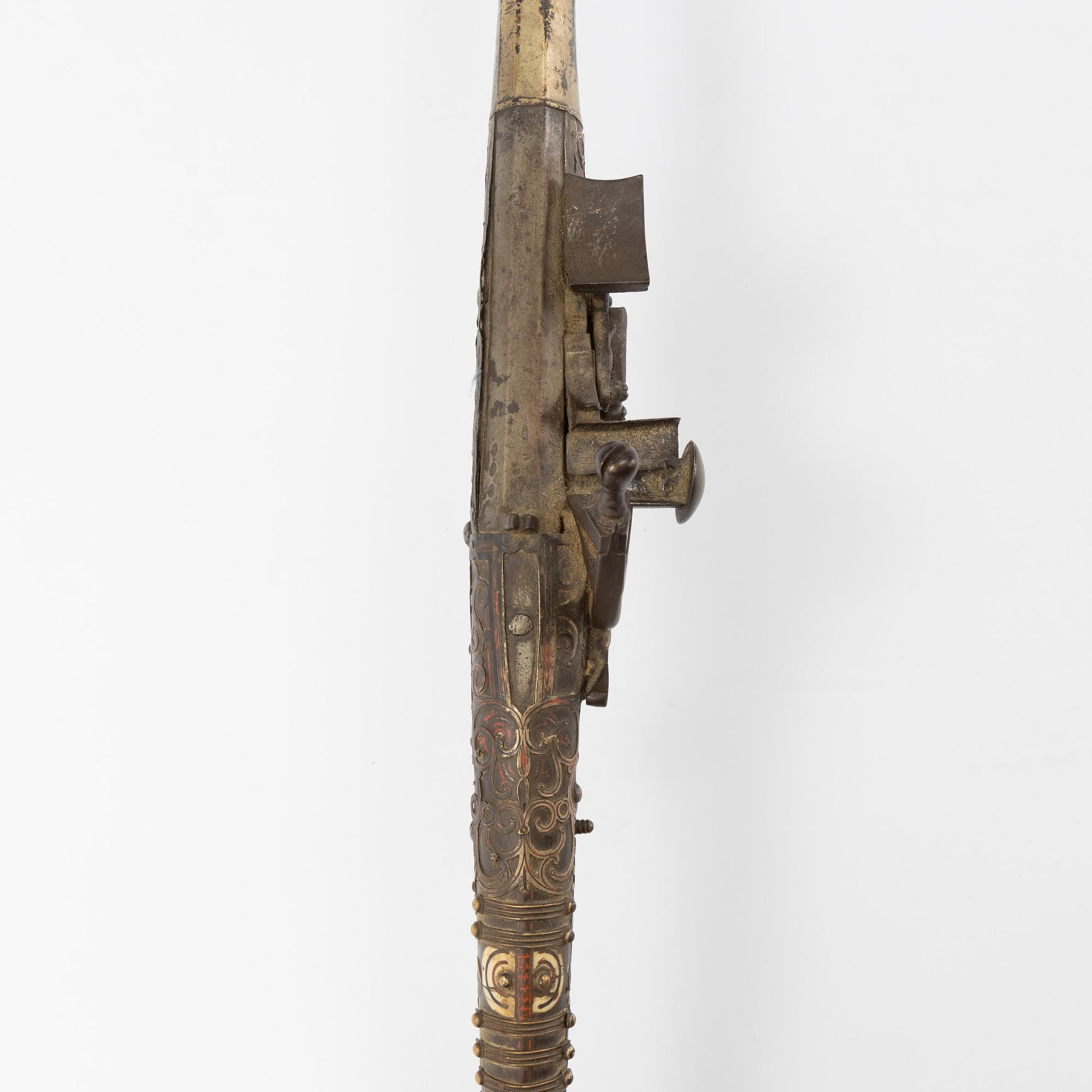 A snaphaunce gun, 19th Century.