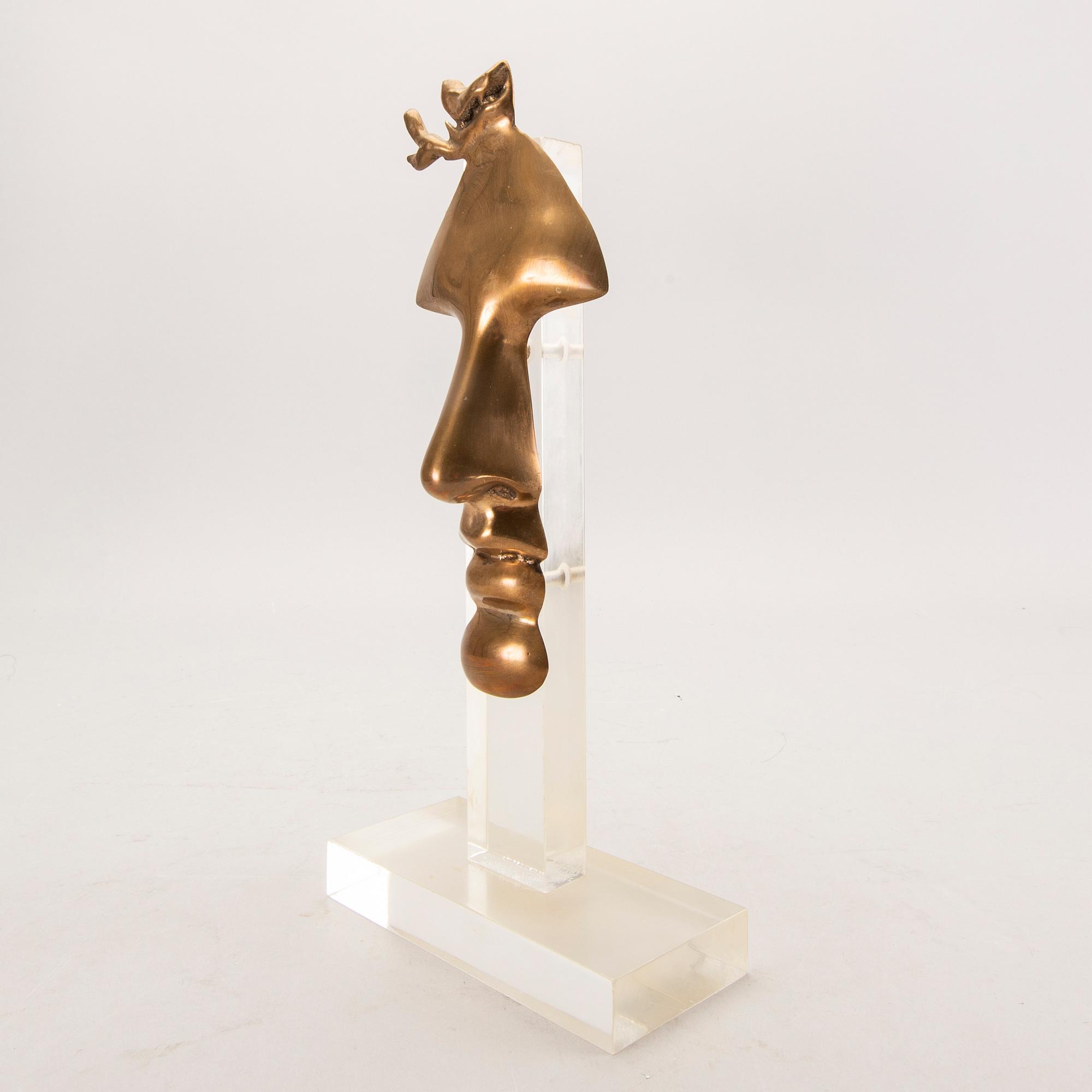Arman, a signed and numbered sculpture.