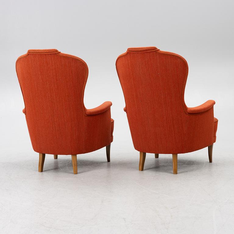 Carl Malmsten, a pair of "Farmor" armchairs, O.H.Sjögren, Sweden, later part of the 20th century.