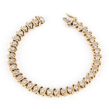 ARMBAND, med briljantslipade diamanter, totalt ca 3,50ct. 14K guld.