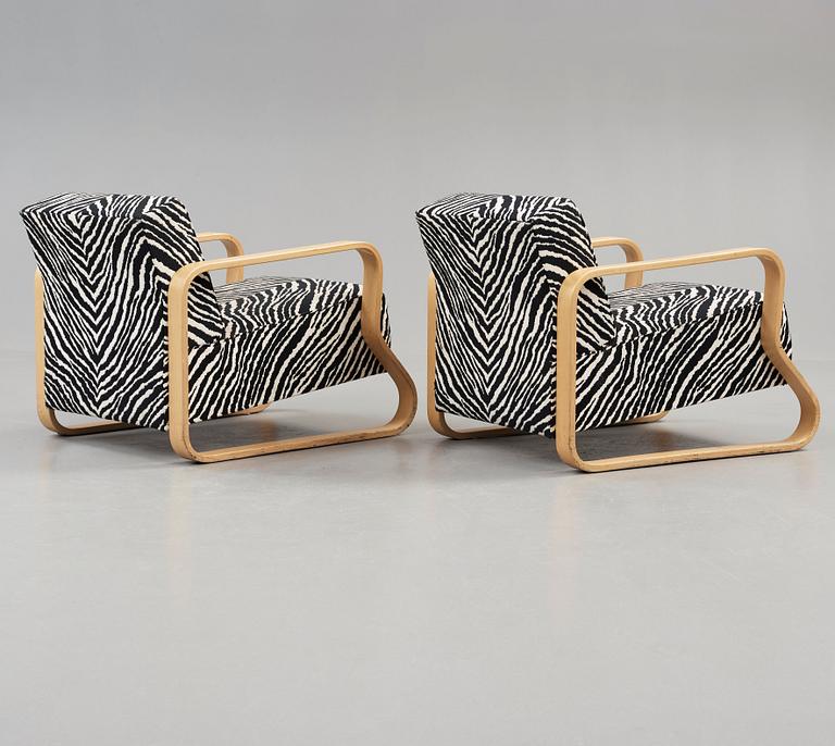 A pair of Alvar Aalto 'Padded Paimio' easy chairs, Artek, Finland.