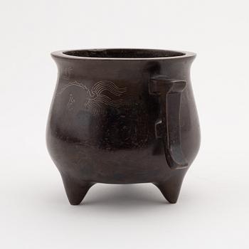 A Chinese tripod bronze censer, 20th century.